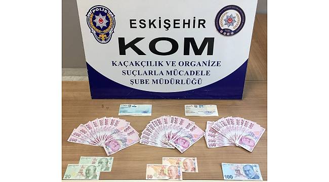 Eskişehir'de kalpazanlar sahte 10 bin lirayı piyasaya sürmek isterken yakalandı