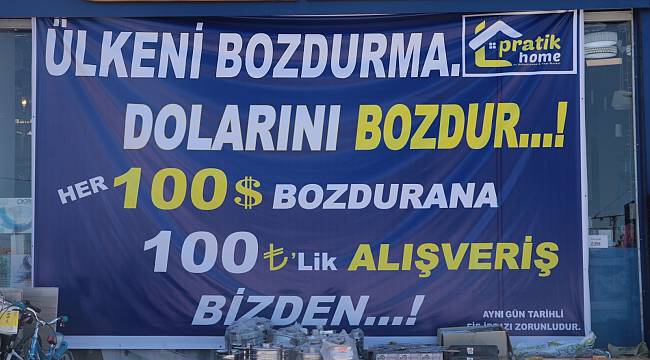 Dolarını bozdurana hediye çeki veriyor
